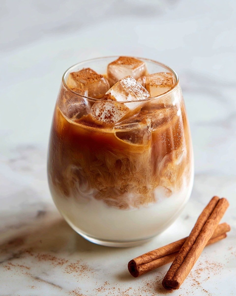 Cookie Butter Iced Chai Latte Recipe - Recipe Image — Cookie Butter Iced Chai Latte, iced chai latte with cookie butter, spiced chai latte recipe, easy iced chai drink, cozy chai latte with cookie butter